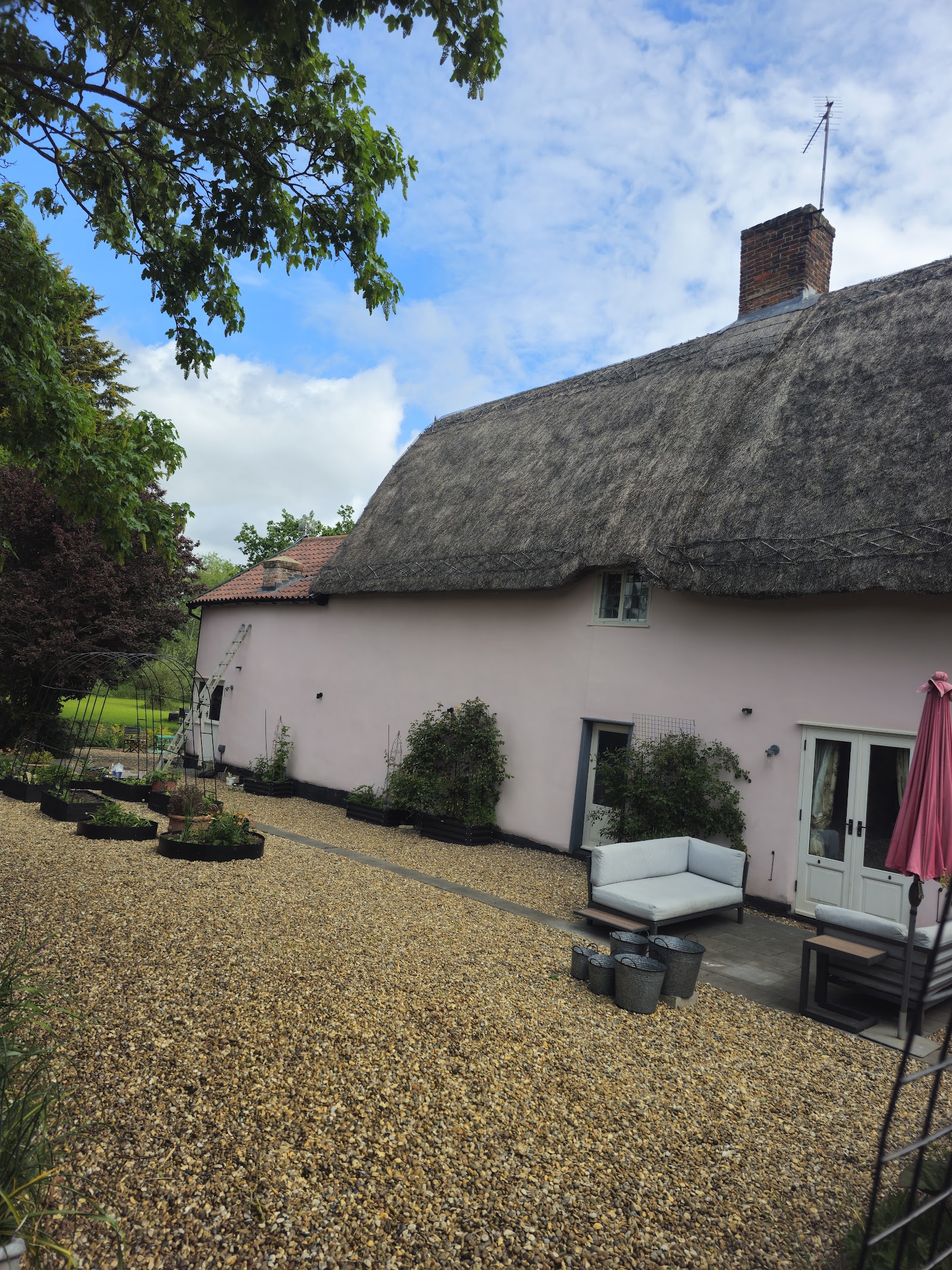Thatched cottage exterior renovation